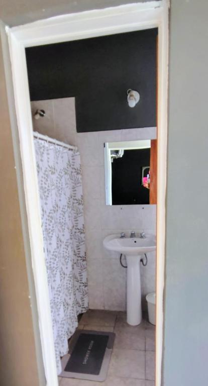 a bathroom with a sink and a mirror at Umbral Del Sol in Colorado River