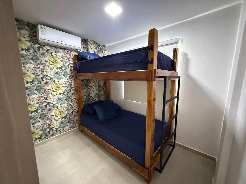 Ένα ή περισσότερα κρεβάτια σε δωμάτιο στο Casa Berlín