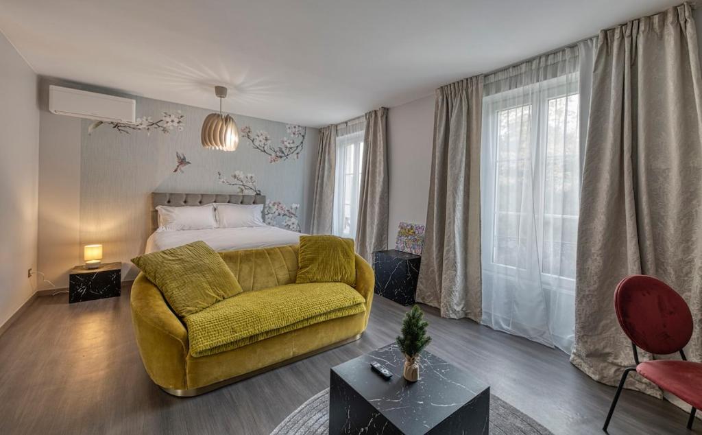 Ένα ή περισσότερα κρεβάτια σε δωμάτιο στο La nuit au Quai Chambre de luxe PinotNoir