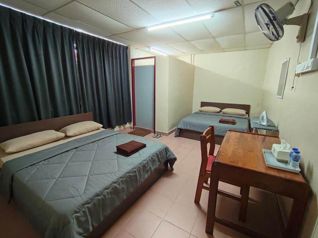 Ένα ή περισσότερα κρεβάτια σε δωμάτιο στο HotelChanglun