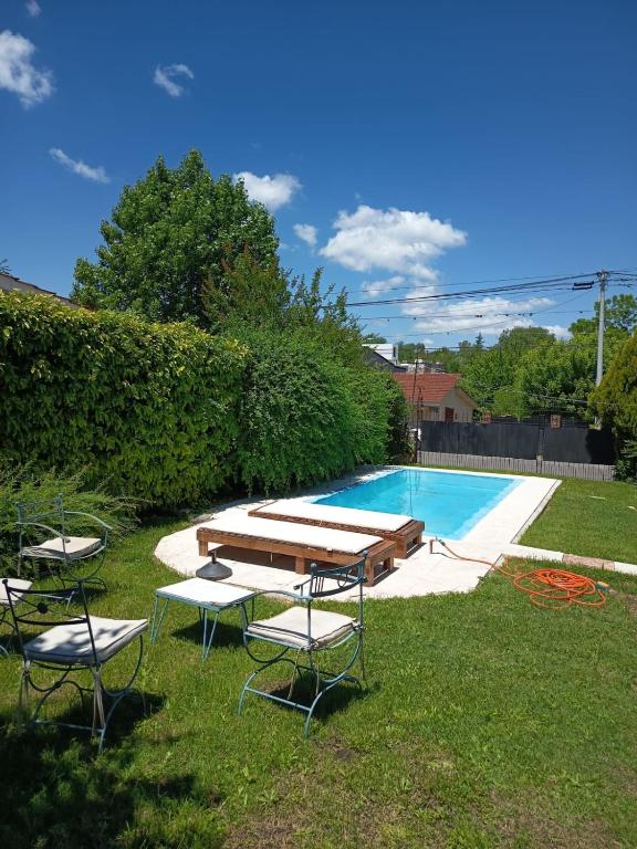 Πισίνα στο ή κοντά στο CASA PARA 5 CON PILETa