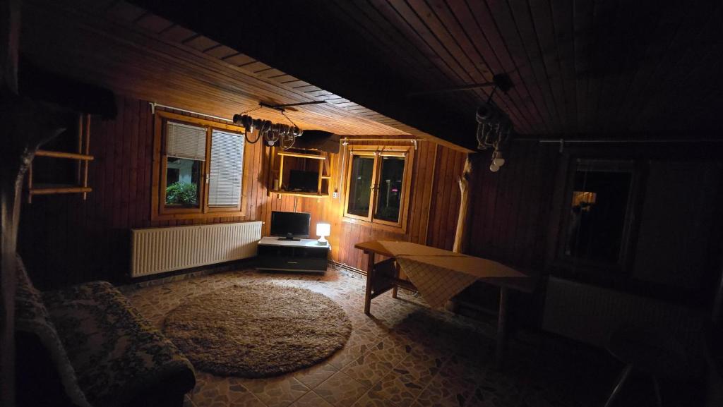 Posezení v ubytování AVS Snagov Chalet