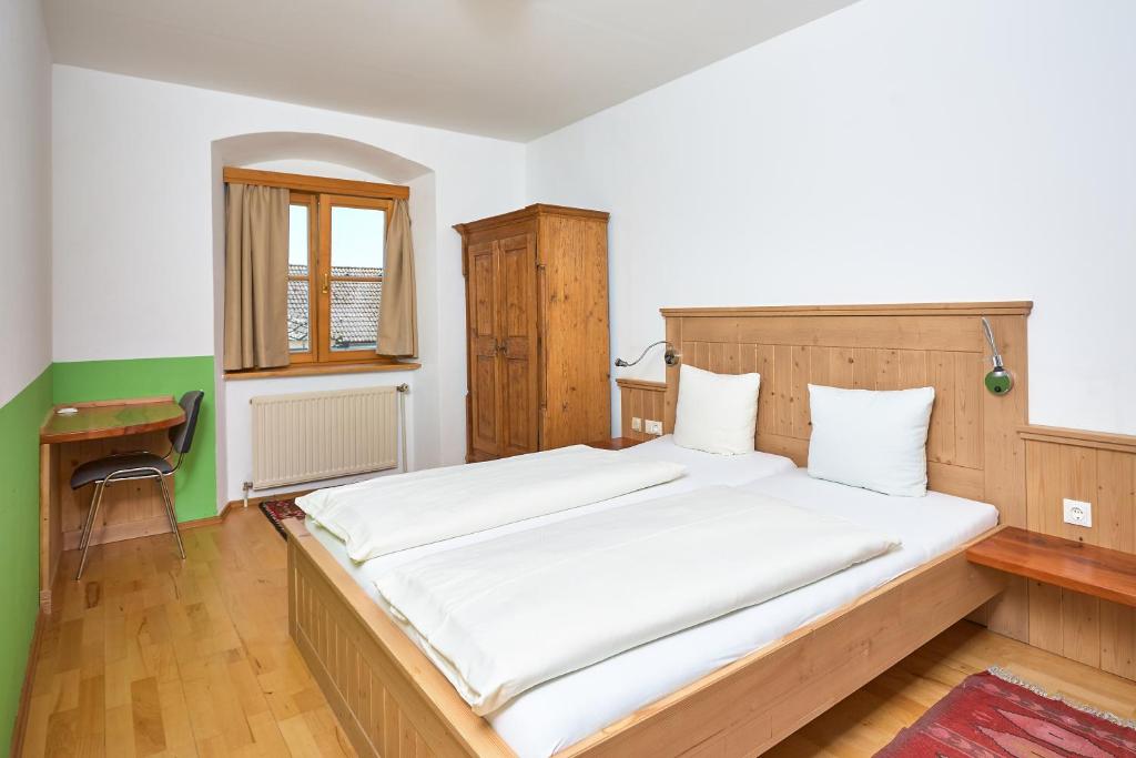 Posteľ alebo postele v izbe v ubytovaní Gasthof Hotel Schiffsmeisterhaus