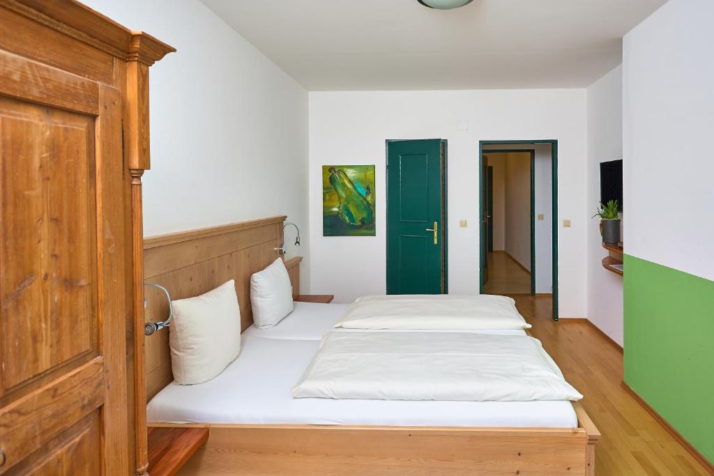 Posteľ alebo postele v izbe v ubytovaní Gasthof Hotel Schiffsmeisterhaus