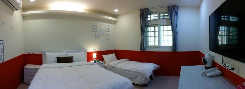 Postel nebo postele na pokoji v ubytování Peacock hotel