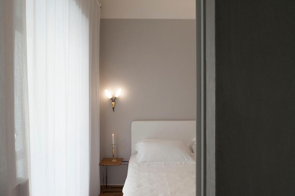Postel nebo postele na pokoji v ubytování Lidia Chambres D'hotes