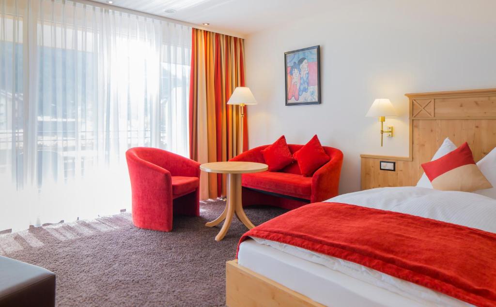 Postel nebo postele na pokoji v ubytování Hotel Taescherhof