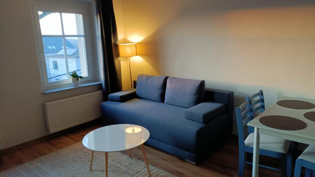 Et opholdsområde på Apartamenty Rudzka