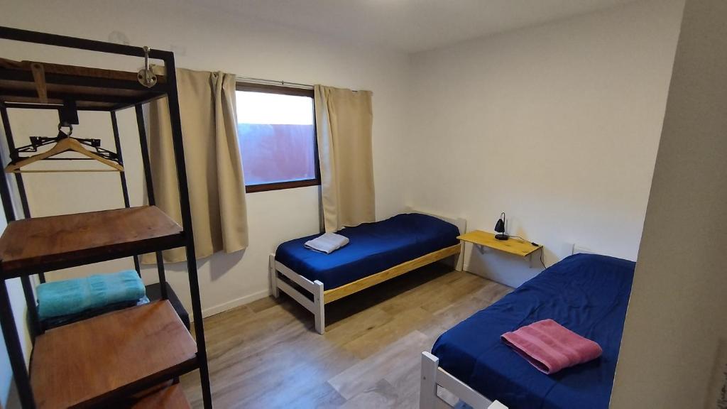 En eller flere senge i et værelse på Cabaña del Mirador 5