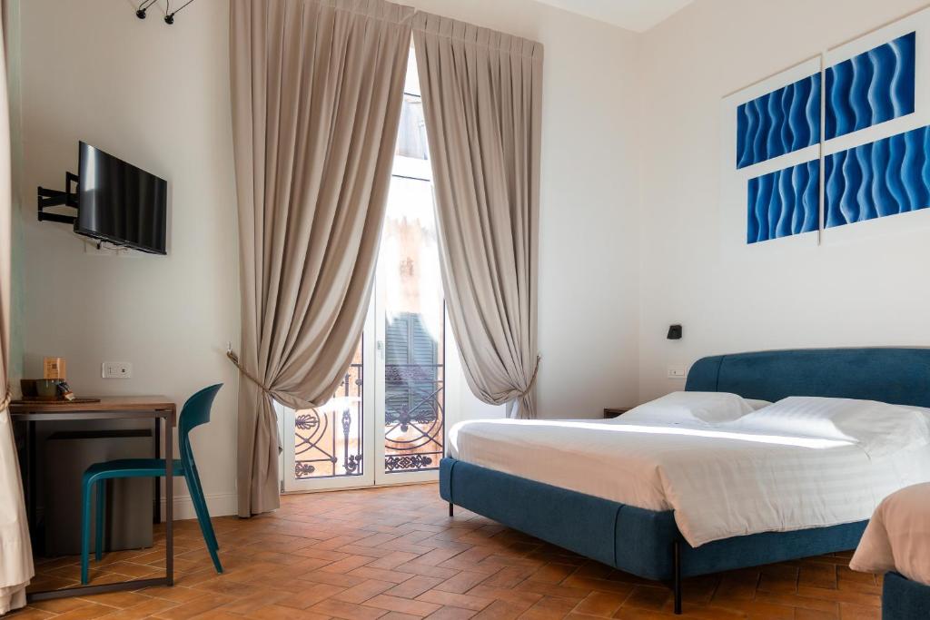 Postel nebo postele na pokoji v ubytování Le Sei Porte