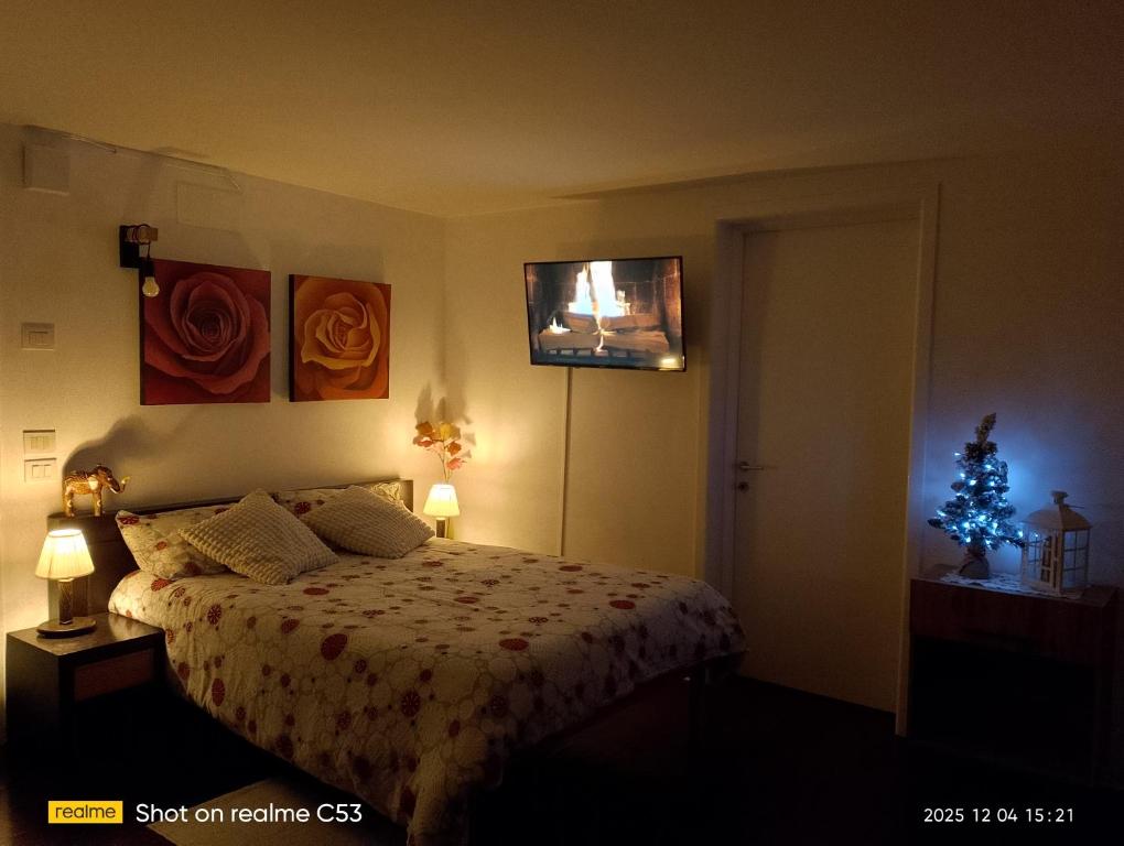 Ένα ή περισσότερα κρεβάτια σε δωμάτιο στο Monolocale zona del prosecco