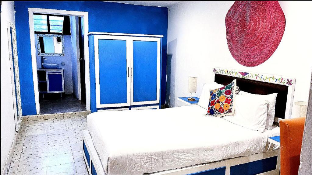 Postel nebo postele na pokoji v ubytování 4 Habitaciómn doble baño propio