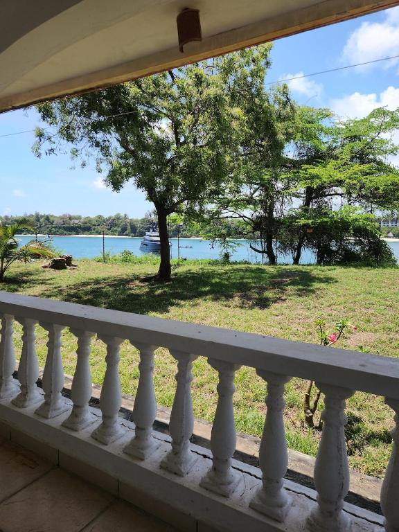 a balcony with a view of the water at Creek apartment in Kilifi