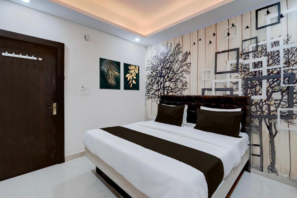 En eller flere senge i et værelse på Hotel O Sindhu Palace