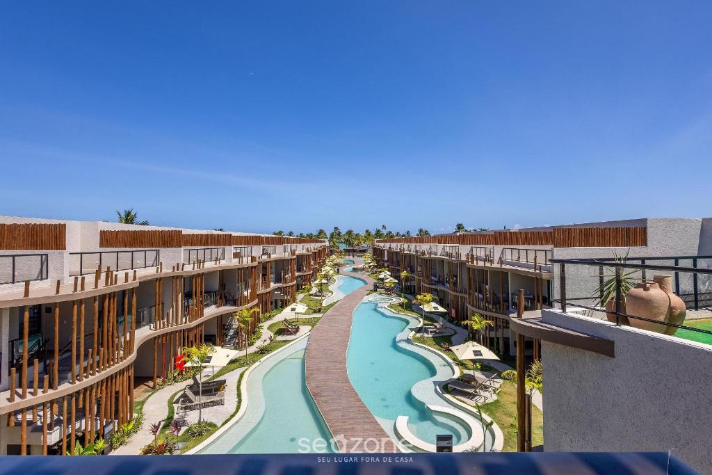 Πισίνα στο ή κοντά στο Apartamentos em Cond. com Piscina em Frente à Praia - NVB