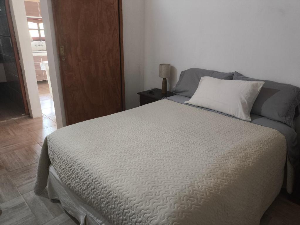 Ένα ή περισσότερα κρεβάτια σε δωμάτιο στο Las Carolas