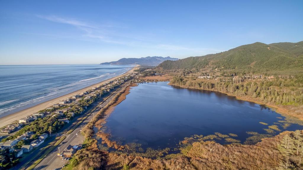 an aerial view of the beach and water at Twin Rocks Retreat in Rockaway Beach