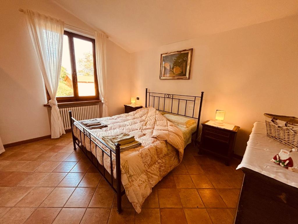 Ένα ή περισσότερα κρεβάτια σε δωμάτιο στο Antica Fiera