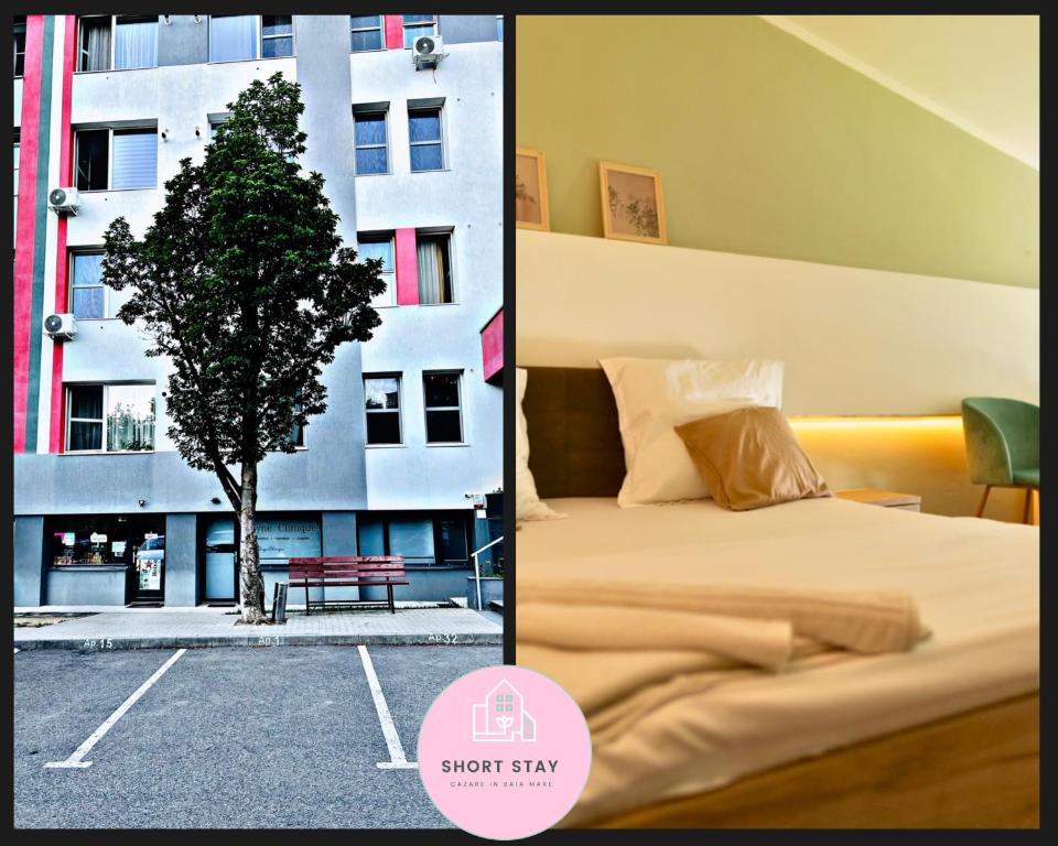 ein Schlafzimmer mit einem Bett und einem Baum vor einem Gebäude in der Unterkunft VIVO Loft by Short-Stay in Baia Mare