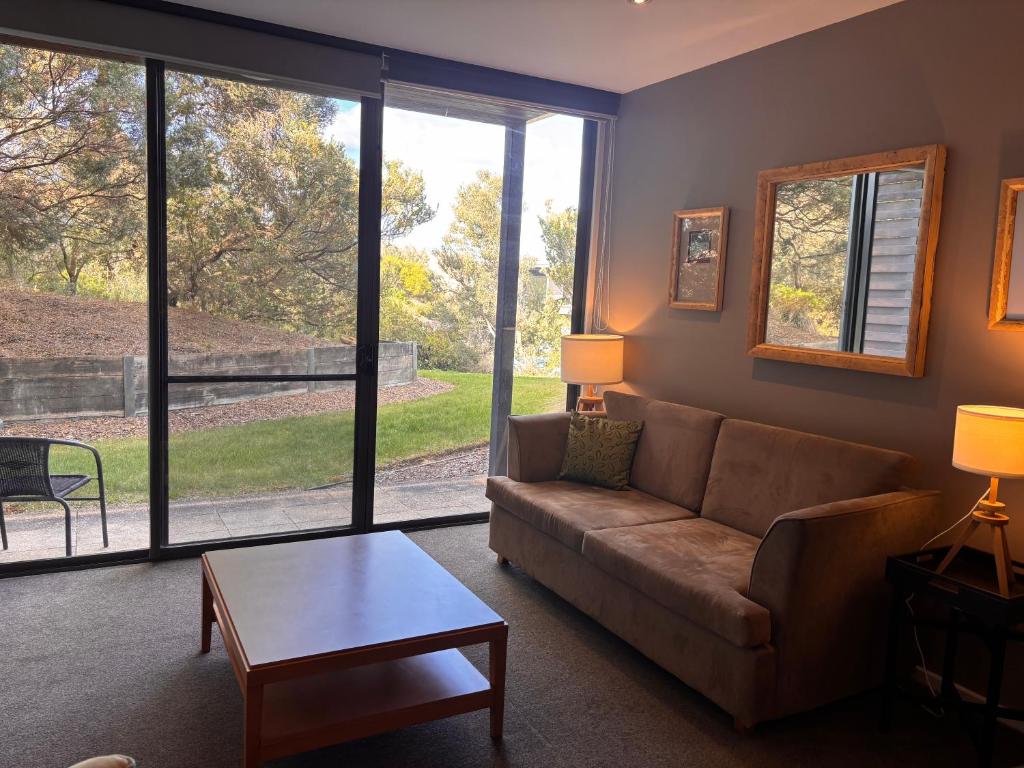 Et opholdsområde på Resort Living with Pool, Golf, Bar and Dining