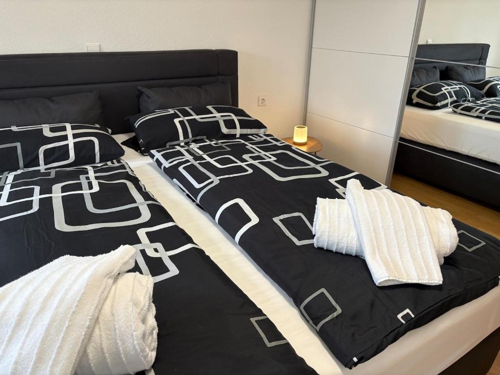 Postel nebo postele na pokoji v ubytování Moderne Wohnung mit toller Aussicht