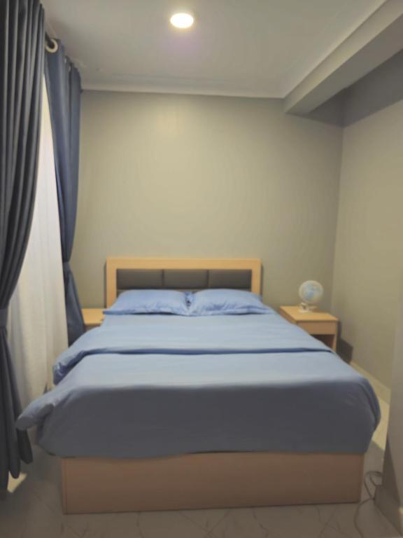 Ένα ή περισσότερα κρεβάτια σε δωμάτιο στο SBJ's Home