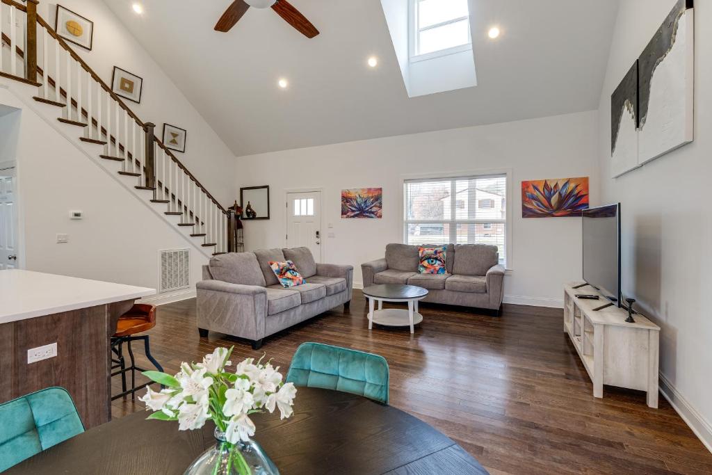 a living room with a couch and a table at Hot Tub and Yard Temptation Stays Home in Roanoke in Cave Spring