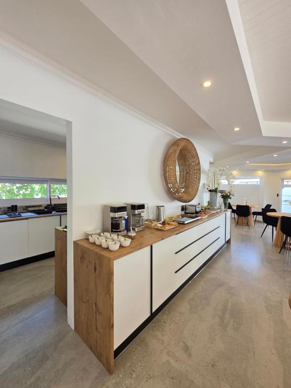 مطبخ أو مطبخ صغير في White Cottage Boutique Guesthouse