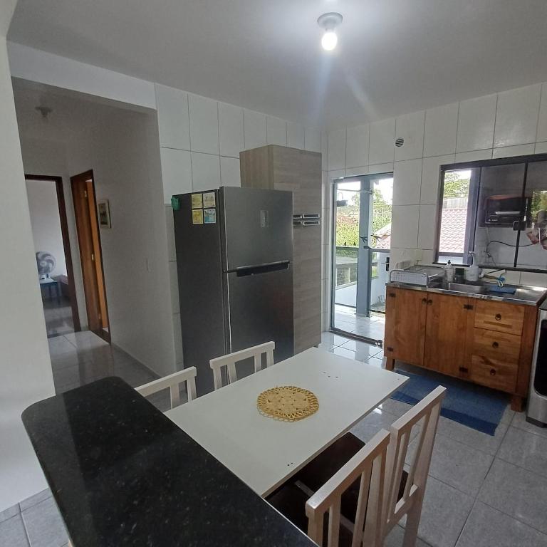 Køkken eller tekøkken på Apartamento aconchegante a poucos minutos do mar