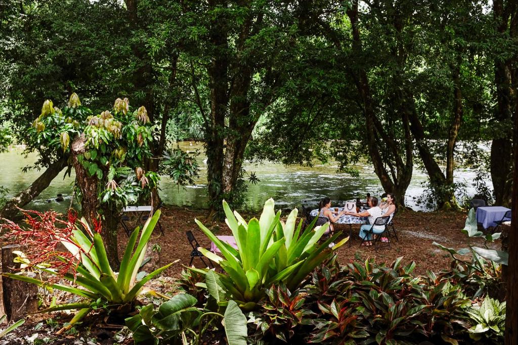 Un jardín fuera de Hotel La Pérgola