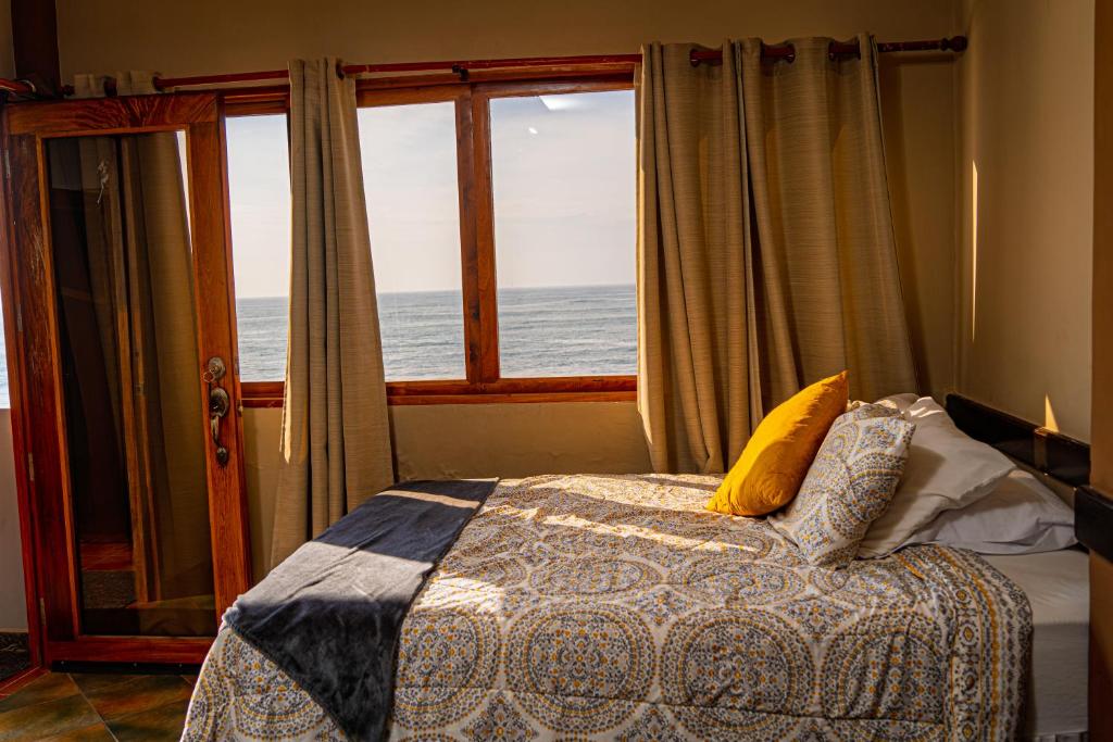 Ένα ή περισσότερα κρεβάτια σε δωμάτιο στο AST Surf Hotel