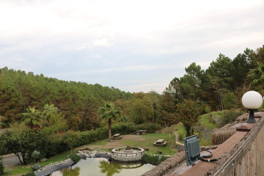 a view of a garden from a bridge at BiOrman Resort in Istanbul