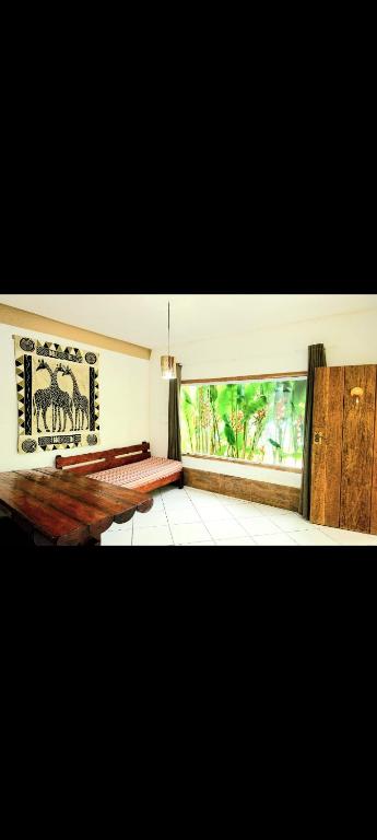 Ένα ή περισσότερα κρεβάτια σε δωμάτιο στο Jadypeba