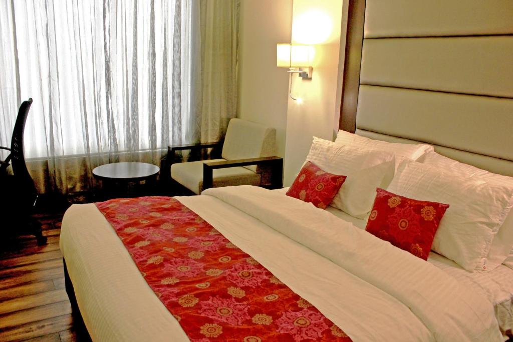 Postel nebo postele na pokoji v ubytování Veronica Hotel