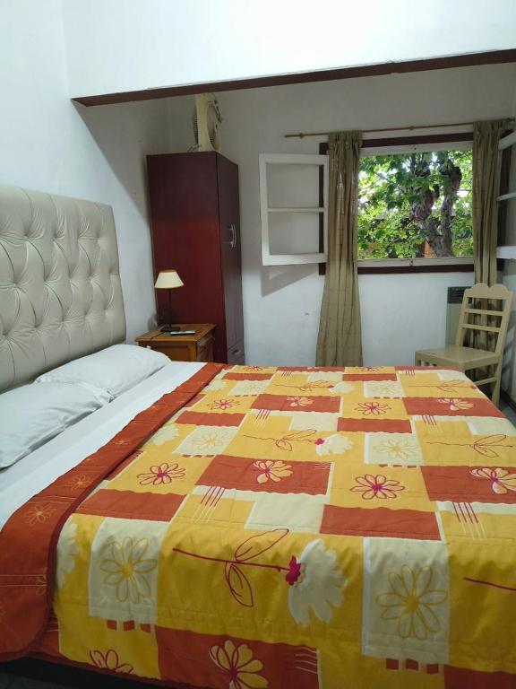 Ένα ή περισσότερα κρεβάτια σε δωμάτιο στο Hosteria Champaqui