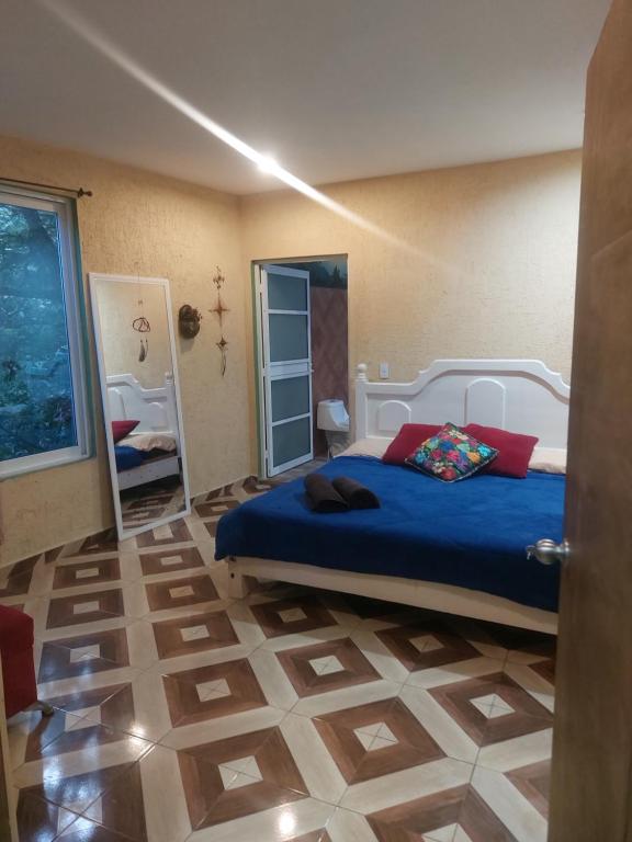 En eller flere senge i et værelse på Suite encantadora con vista al Rio