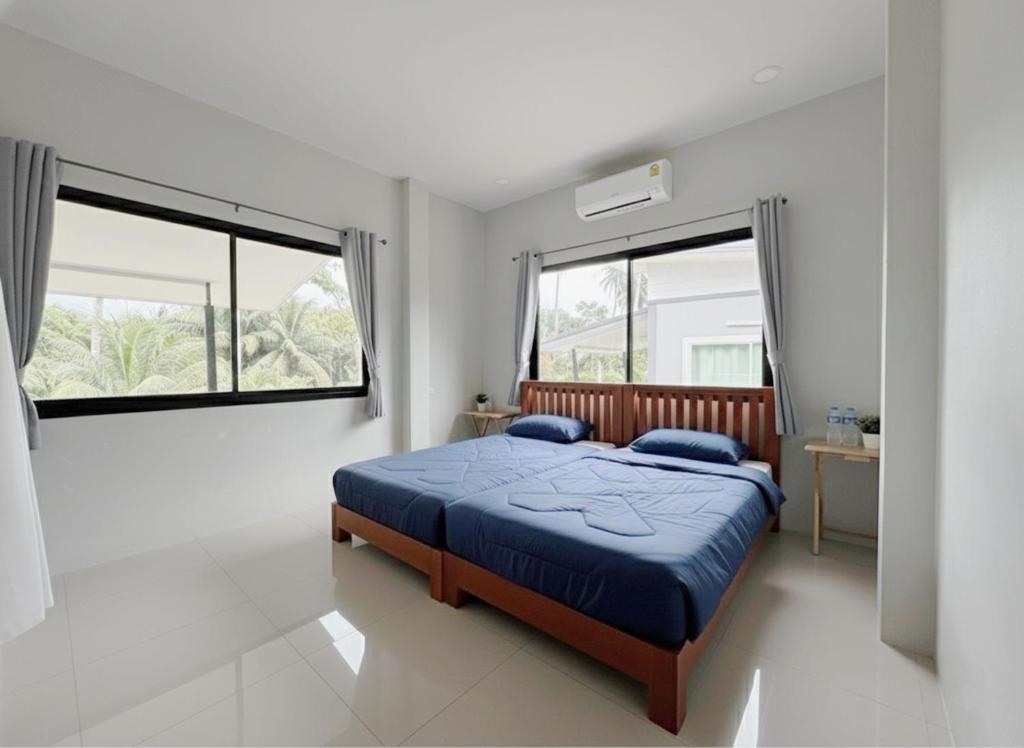 Postel nebo postele na pokoji v ubytování Chon Nara Place 2