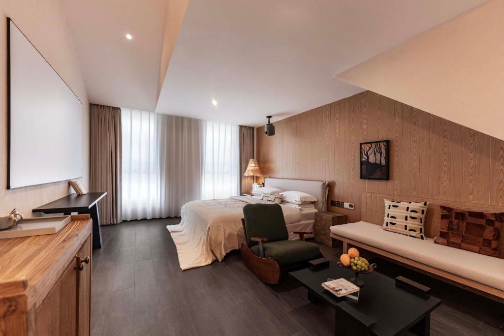 Posezení v ubytování AND·U Designer Homestay (Dukezong Ancient Town Moonlight Square Branch)