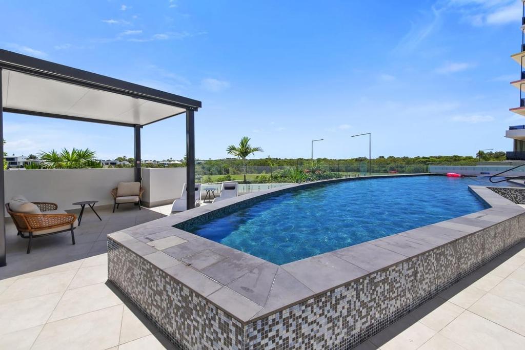 Πισίνα στο ή κοντά στο Azzure Beachside Bokarina Escape