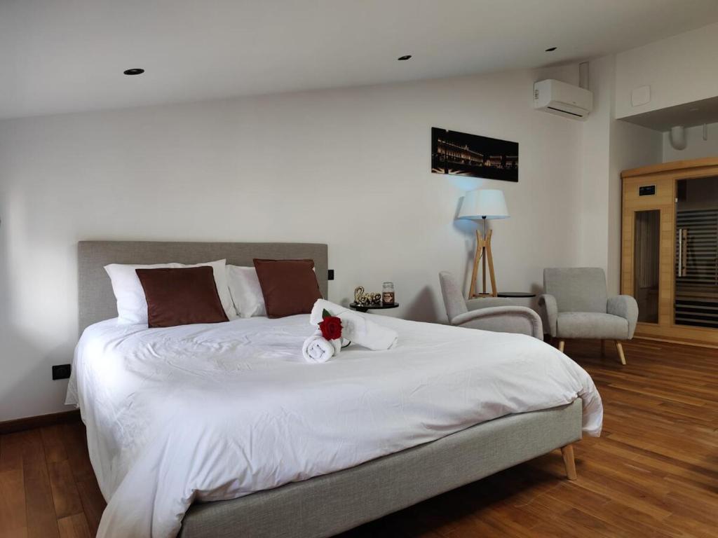 Ένα ή περισσότερα κρεβάτια σε δωμάτιο στο L escapade de Stan