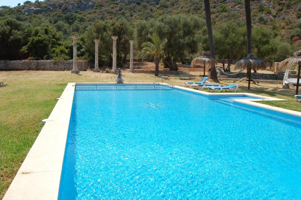 The swimming pool at or close to Rural Charm villa and Outdoor Adventure Agritourism Apartment with Private Mountain Path approximately 5 minutes walking from the beach Ideal for relaxation