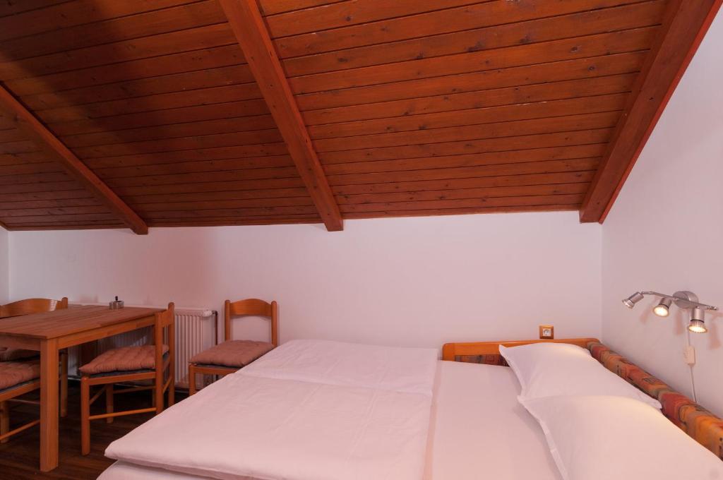 Posteľ alebo postele v izbe v ubytovaní Apartments Larsen