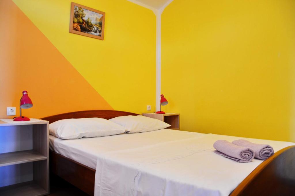 Posteľ alebo postele v izbe v ubytovaní Apartments Joza