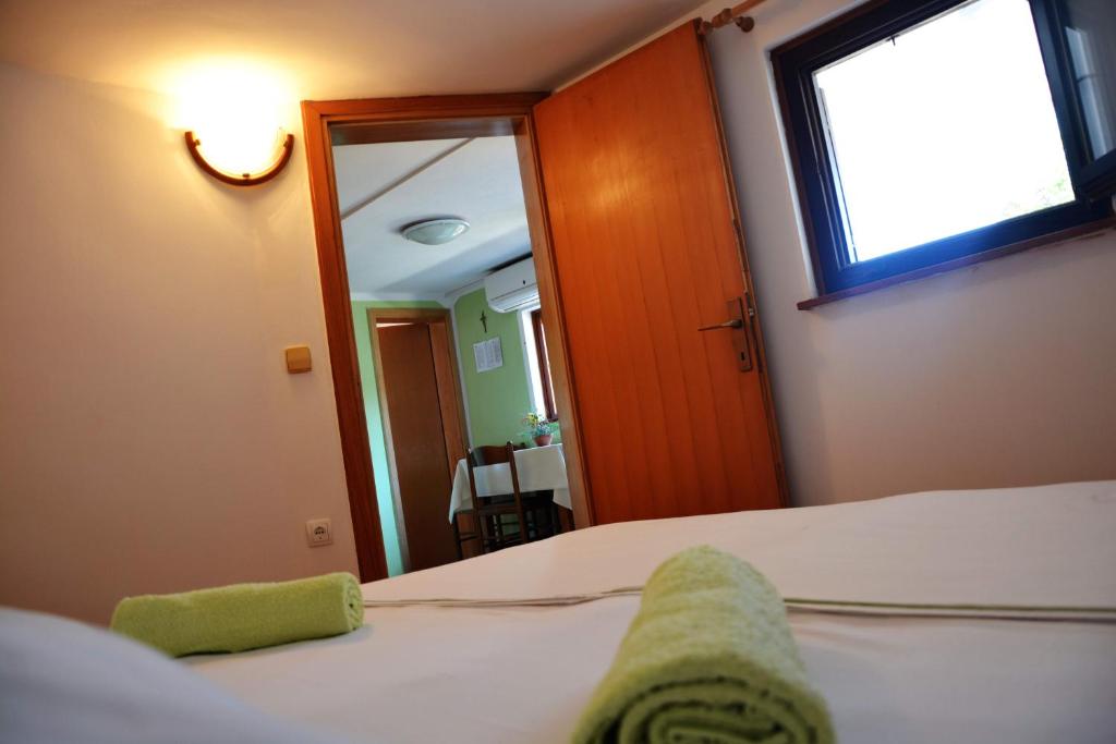 Posteľ alebo postele v izbe v ubytovaní Apartments Joza
