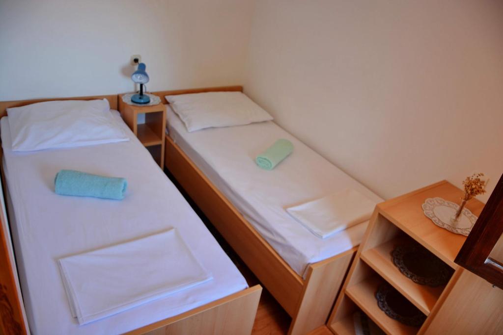 Posteľ alebo postele v izbe v ubytovaní Apartments Joza