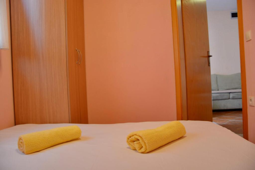 Posteľ alebo postele v izbe v ubytovaní Apartments Joza