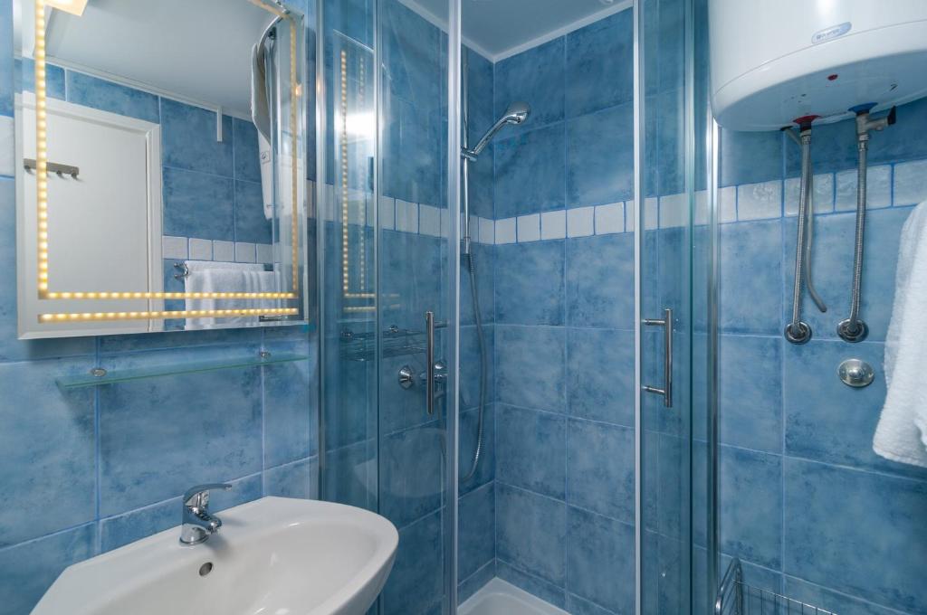 Kúpeľňa v ubytovaní Apartments Larsen