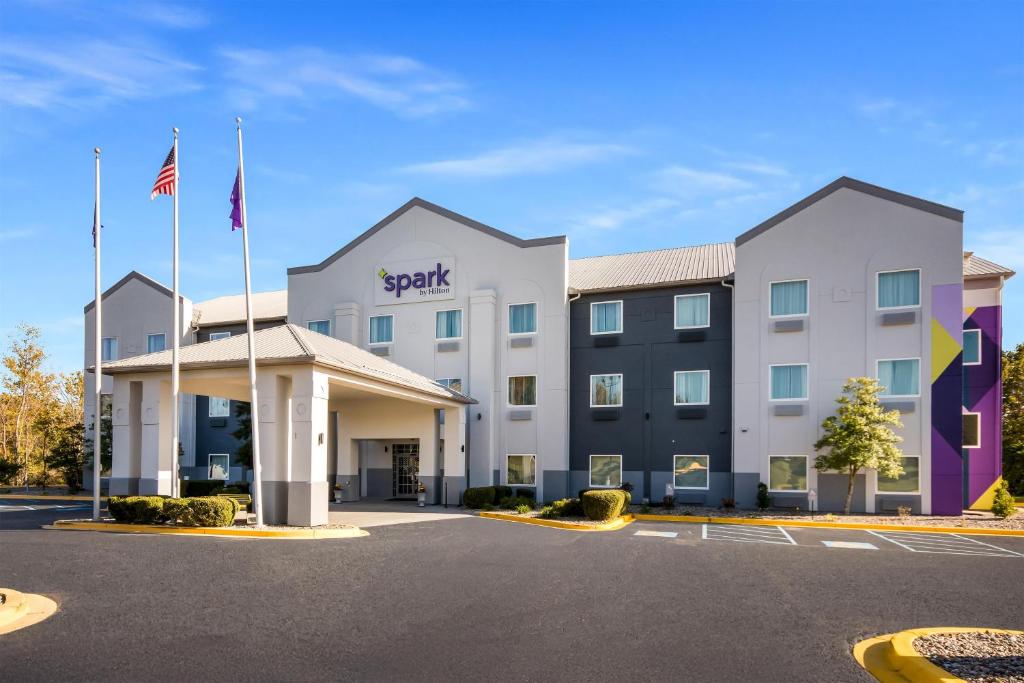 a rendering of a hotel with a parking lot at Spark by Hilton La Grange in La Grange