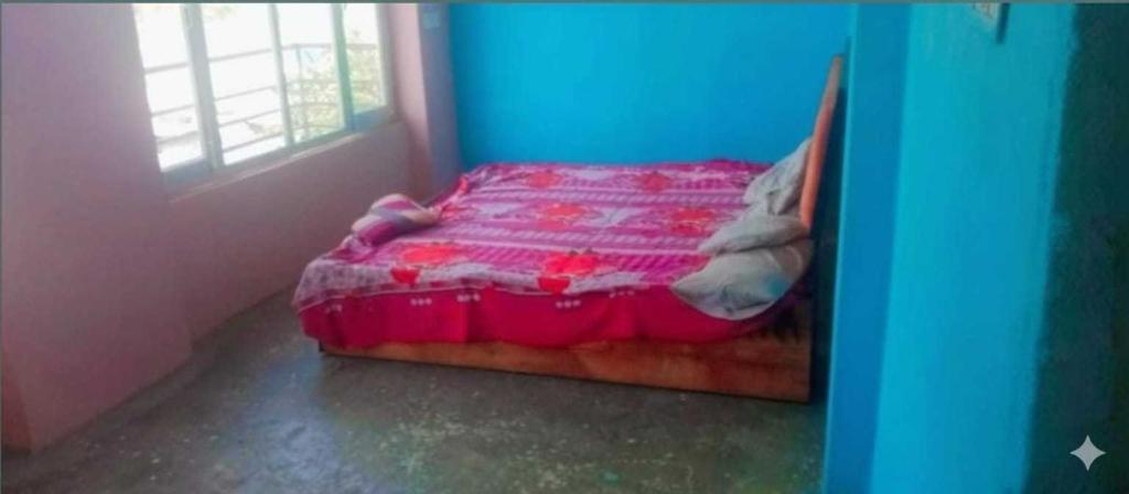 a small childs bedroom with a bed in a room at SPOT ON Pawan Restaurant & Dhabha in Phāphāmau