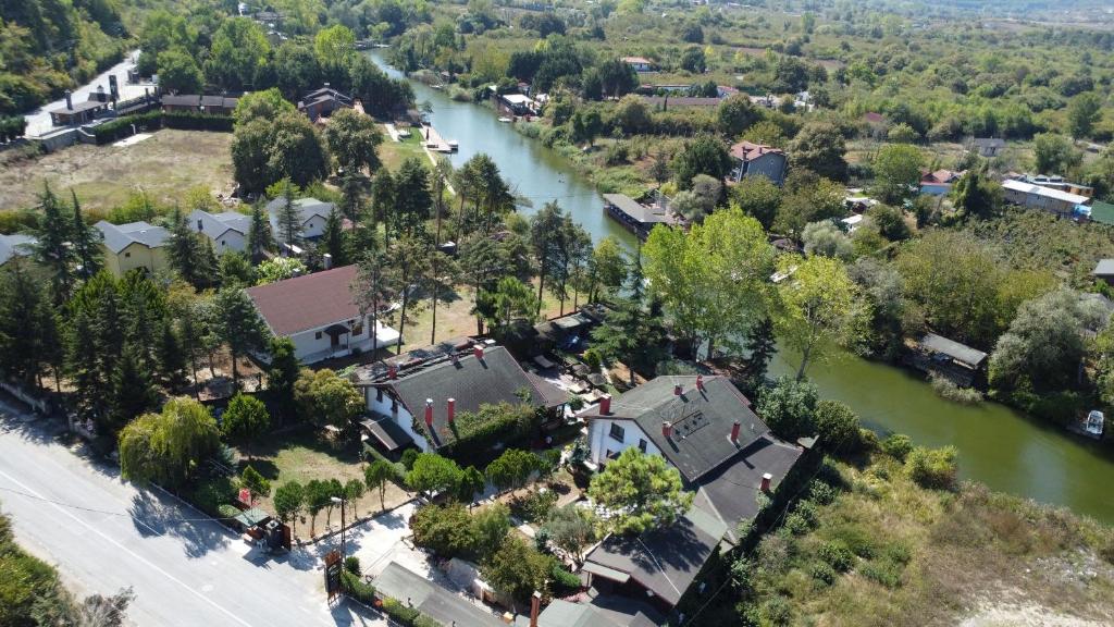 an aerial view of a town next to a river at Treetops Park Hotel in Sile